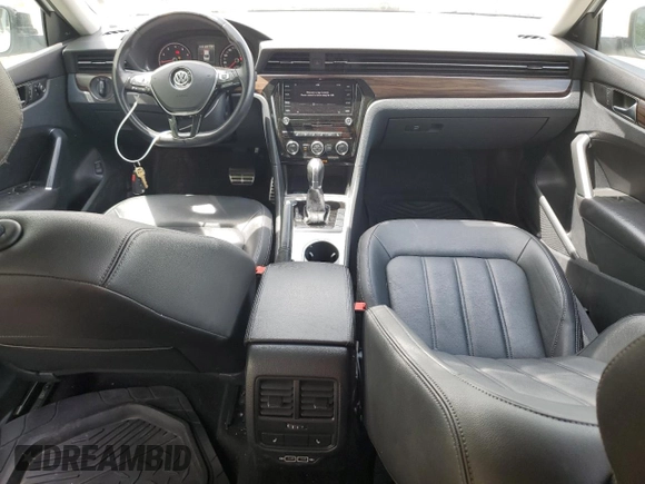 2020 Volkswagen Passat with VIN 1VWEA7A32LC004720, listed as a Copart auction lot 57310295 with 125,589 mi miles and Salvage title. Bid and sale history available at DreamBid. Image 8.