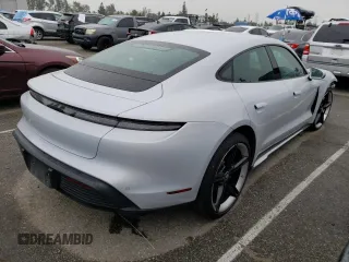 2021 Porsche Taycan 4S z VIN WP0AB2Y15MSA44483, wystawiony jako Copart lot #44510623 z przebiegiem 27 812 mil mil oraz . Historia ofert i sprzedaży dostępna na DreamBid. Obrazek 3.