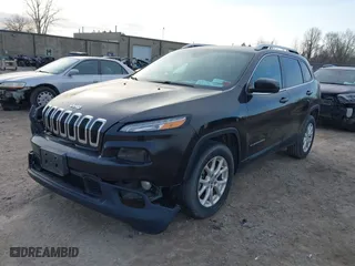 2015 Jeep Cherokee Latitude with VIN 1C4PJMCB0FW575320, listed as a IAAI auction lot 41787112 with 143,226 mi miles. Bid and sale history available at carsss.com. Image 18.