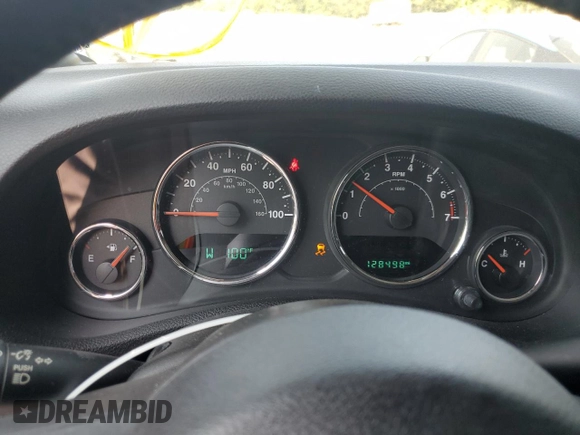 2016 Jeep Wrangler Unlimited Sahara with VIN 1C4BJWEGXGL310499, listed as a Copart auction lot 59756015 with 128,498 mi miles and Salvage title. Bid and sale history available at DreamBid. Image 9.