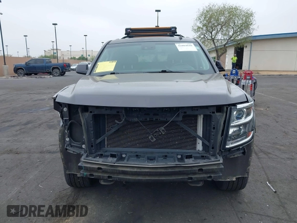 2015 Chevrolet Tahoe LT with VIN 1GNSCBKC1FR233898, listed as a IAAI auction lot 42004048 with 115,779 mi miles and . Bid and sale history available at DreamBid. Image 13.