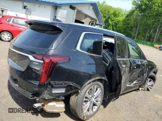 2025 Cadillac XT6 AWD Premium Luxury z VIN 1GYKPDRS9SZ120694, wystawiony jako Copart lot #57130005 z przebiegiem Nie podano mil oraz Szkody całkowita. Historia ofert i sprzedaży dostępna na DreamBid. Obrazek 3.