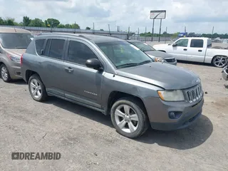 2011 Jeep Compass Latitude with VIN 1J4NT1FB4BD246549, listed as a IAAI auction lot 42156761 with 232,739 mi miles. Bid and sale history available at carsss.com. Image 1.