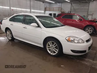 2012 Chevrolet Impala LTZ with VIN 2G1WC5E33C1331027, listed as a IAAI auction lot 42170924 with 211,065 mi miles and . Bid and sale history available at DreamBid. Image 1.