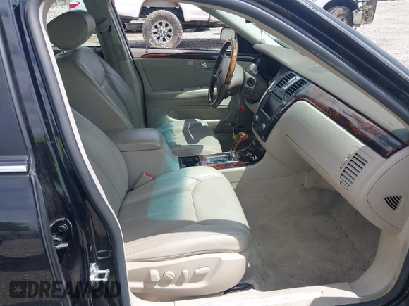 2006 Cadillac DTS 1SD z VIN 1G6KD57Y96U213474, wystawiony jako IAAI lot #42204202 z przebiegiem 102 627 mil mil oraz . Historia ofert i sprzedaży dostępna na DreamBid. Obrazek 5.