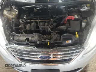 2013 Ford Fiesta SE z VIN 3FADP4BJ8DM220456, wystawiony jako Copart lot #58596825 z przebiegiem 115 933 mil mil oraz Szkoda całkowita • Salvage title. Historia ofert i sprzedaży dostępna na DreamBid. Obrazek 11.