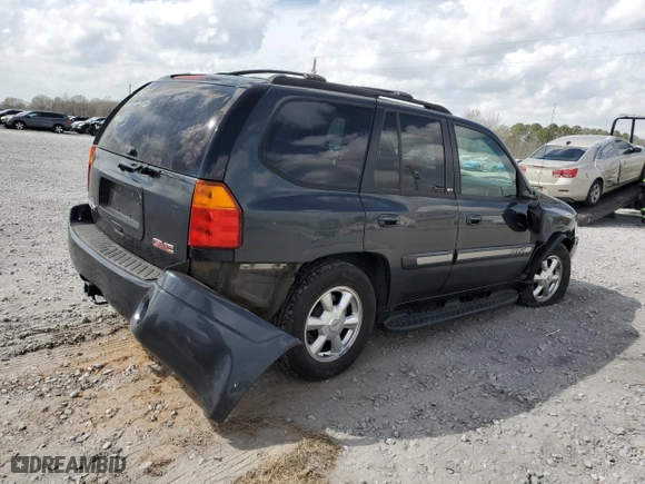 2004 GMC Envoy SLT with VIN 1GKDS13S742444571, listed as a Copart auction lot 49214705 with 217,636 mi miles and Salvage Title. Bid and sale history available at carsss.com. Image 3.
