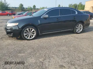 2009 Lincoln MKS with VIN 1LNHM94R69G612496, listed as a Copart auction lot 59118905 with 105,064 mi miles and Salvage title. Bid and sale history available at DreamBid. Image 1.