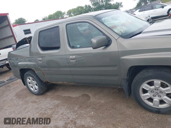 2007 Honda Ridgeline RTL with VIN 2HJYK16517H513832, listed as a IAAI auction lot 42626411 with 209,171 mi miles and . Bid and sale history available at DreamBid. Image 13.