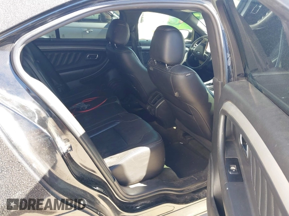 2014 Ford Taurus SEL with VIN 1FAHP2E83EG184976, listed as a IAAI auction lot 41590153 with 177,342 mi miles. Bid and sale history available at carsss.com. Image 8.