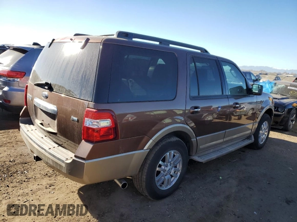 2012 Ford Expedition XLT с VIN 1FMJU1J56CEF22689, выставлен на аукционе Copart как лот 82852054 с пробегом 168 563 миль миль и Списание • Salvage title. История ставок и продаж доступна на DreamBid. Изображение 3.