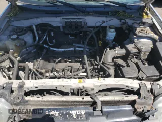 2005 Ford Escape XLS Value with VIN 1FMYU92Z55KC93604, listed as a Copart auction lot 60104145 with 86,788 mi miles and Salvage title. Bid and sale history available at DreamBid. Image 12.