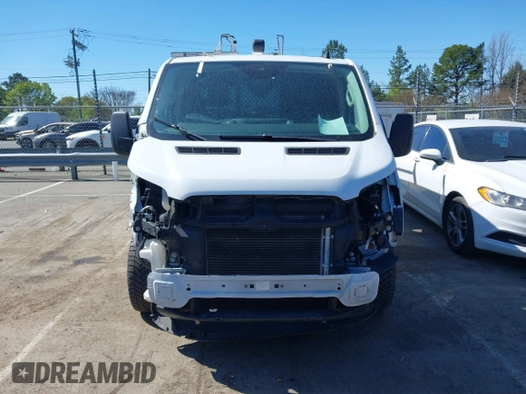 2020 Ford Transit Cargo z VIN 1FTBR1Y84LKB79621, wystawiony jako IAAI lot #41802213 z przebiegiem 89 167 mil mil oraz . Historia ofert i sprzedaży dostępna na DreamBid. Obrazek 12.