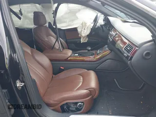 2012 Audi A8 with VIN WAURVAFDXCN017546, listed as a IAAI auction lot 39830968 with 123,089 mi miles and . Bid and sale history available at DreamBid. Image 5.