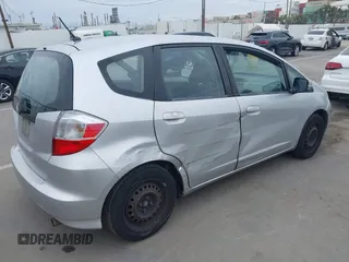 2013 Honda Fit with VIN JHMGE8H38DC002109, listed as a IAAI auction lot 42067257 with 305,739 mi miles. Bid and sale history available at carsss.com. Image 4.