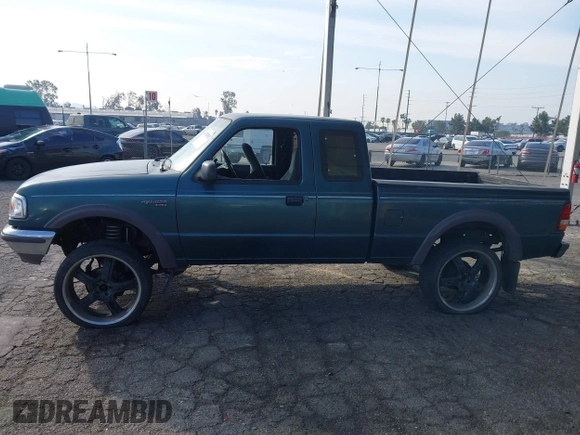 1997 Ford Ranger XLT with VIN 1FTDR15X5VPA65640, listed as a IAAI auction lot 41436818 with 212,661 mi miles. Bid and sale history available at carsss.com. Image 15.