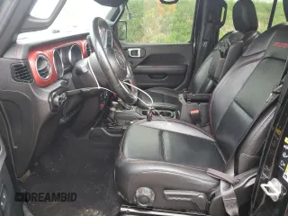 2021 Jeep Wrangler Unlimited Rubicon with VIN 1C4HJXFNXMW612186, listed as a Copart auction lot 56786665 with 52,379 mi miles and Salvage title. Bid and sale history available at DreamBid. Image 7.