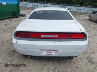 2013 Dodge Challenger SXT с VIN 2C3CDYAG0DH607372, выставлен на аукционе IAAI как лот 42819112 с пробегом 223 376 миль миль и . История ставок и продаж доступна на DreamBid. Изображение 16.