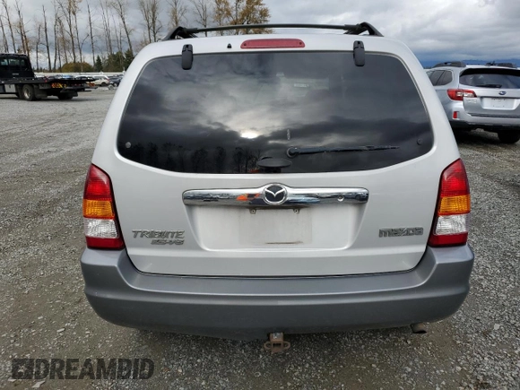 2002 Mazda Tribute LX with VIN 4F2CU08192KM41728, listed as a Copart auction lot 78221954 with 140,782 mi miles and Salvage Title. Bid and sale history available at carsss.com. Image 6.