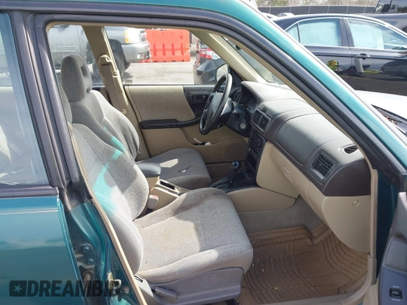 2001 Subaru Forester L with VIN JF1SF635X1H717371, listed as a IAAI auction lot 41719771 with 221,590 mi miles. Bid and sale history available at carsss.com. Image 5.