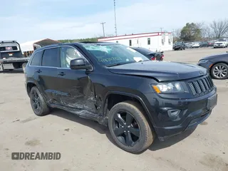 2015 Jeep Grand Cherokee Laredo with VIN 1C4RJFAG6FC909368, listed as a IAAI auction lot 41824703 with 125,994 mi miles. Bid and sale history available at carsss.com. Image 1.