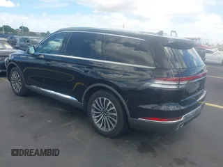 2021 Lincoln Aviator Reserve with VIN 5LM5J7WC0MGL12385, listed as a IAAI auction lot 42472422 with 20,404 mi miles and . Bid and sale history available at DreamBid. Image 3.