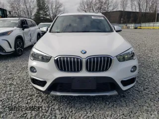 2017 BMW X1 xDrive28i with VIN WBXHT3C32H5F76601, listed as a Copart auction lot 49889965 with 95,655 mi miles and Salvage Title. Bid and sale history available at carsss.com. Image 5.
