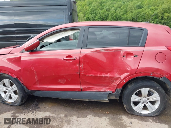 2012 Kia Sportage LX with VIN KNDPB3A23C7311640, listed as a IAAI auction lot 42258206 with 220,000 mi miles and . Bid and sale history available at DreamBid. Image 14.