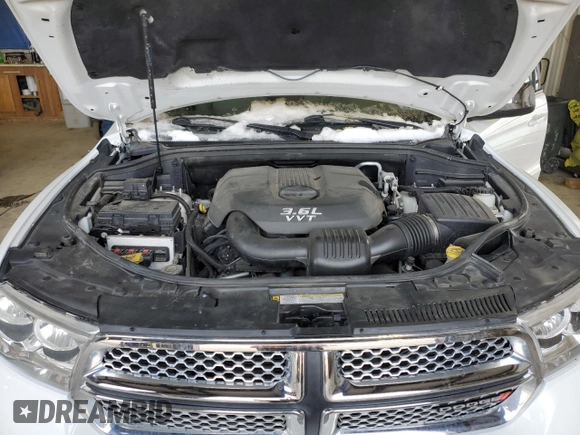 2013 Dodge Durango SXT with VIN 1C4RDJAG4DC564946, listed as a Copart auction lot 44162164 with 103,849 mi miles and Clean title. Bid and sale history available at DreamBid. Image 14.