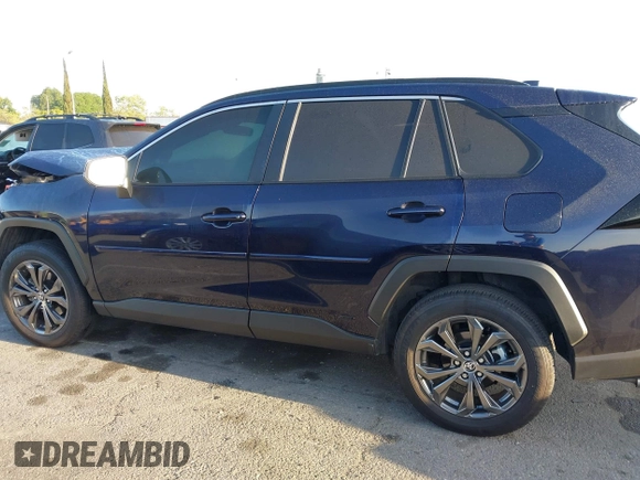 2024 Toyota RAV4 Hybrid XLE Premium with VIN JTMB6RFV0RD141316, listed as a IAAI auction lot 41980384 with 13,270 mi miles and . Bid and sale history available at DreamBid. Image 14.