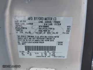 2005 Ford Escape Limited with VIN 1FMYU04165KB19009, listed as a IAAI auction lot 39055762 with 180,484 mi miles. Bid and sale history available at carsss.com. Image 9.