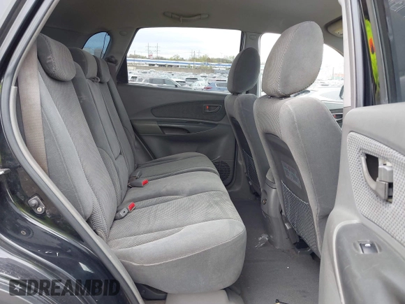 2007 Hyundai Tucson SE with VIN KM8JN12D77U667867, listed as a IAAI auction lot 42082092 with 240,911 mi miles. Bid and sale history available at carsss.com. Image 8.