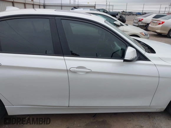 2015 BMW 3 Series 320i with VIN WBA3B1C5XFK140734, listed as a IAAI auction lot 42141319 with 84,863 mi miles and . Bid and sale history available at DreamBid. Image 13.