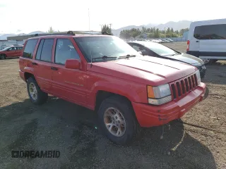 1996 Jeep Grand Cherokee Limited with VIN 1J4GZ78Y0TC230643, listed as a Copart auction lot 67796434 with 193,583 mi miles and Clean Title. Bid and sale history available at carsss.com. Image 4.