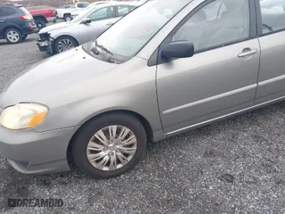 2004 Toyota Corolla CE with VIN 2T1BR32E24C309957, listed as a IAAI auction lot 41894304 with 299,999 mi miles. Bid and sale history available at carsss.com. Image 6.