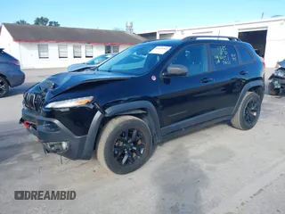 2018 Jeep Cherokee Trailhawk with VIN 1C4PJMBX3JD546332, listed as a IAAI auction lot 41269245 with 88,466 mi miles. Bid and sale history available at carsss.com. Image 17.