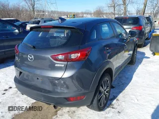 2017 Mazda CX-3 Touring with VIN JM1DKFC72H0167205, listed as a IAAI auction lot 41333632 with 106,063 mi miles. Bid and sale history available at carsss.com. Image 4.