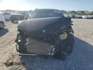 2022 BMW X1 sDrive28i with VIN WBXJG7C03N5U52669, listed as a Copart auction lot 87806305 with 27,609 mi miles and Salvage Title. Bid and sale history available at carsss.com. Image 5.