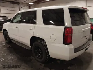 2020 Chevrolet Tahoe Commercial with VIN 1GNSKDECXLR260202, listed as a IAAI auction lot 41608712 with 137,214 mi miles. Bid and sale history available at carsss.com. Image 3.