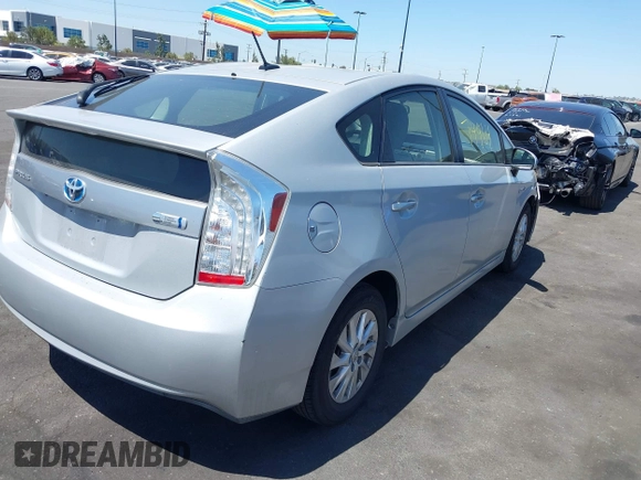 2012 Toyota Prius with VIN JTDKN3DP3C3022628, listed as a IAAI auction lot 42374964 with 103,388 mi miles and . Bid and sale history available at DreamBid. Image 4.