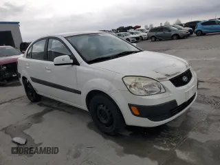 2009 Kia Rio LX with VIN KNADE223X96439445, listed as a Copart auction lot 54619335 with 102,120 mi miles and Salvage Title. Bid and sale history available at DreamBid. Image 4.