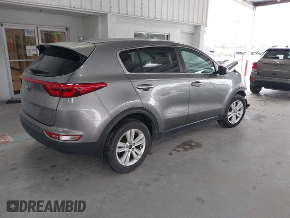 2019 Kia Sportage LX with VIN KNDPM3AC0K7561130, listed as a IAAI auction lot 41391657 with 152,728 mi miles and . Bid and sale history available at carsss.com. Image 4.