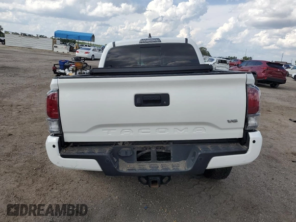 2022 Toyota Tacoma SR с VIN 3TMCZ5AN0NM468020, выставлен на аукционе Copart как лот 58708235 с пробегом 112 523 миль миль и На запчасти • Non repairable. История ставок и продаж доступна на DreamBid. Изображение 6.