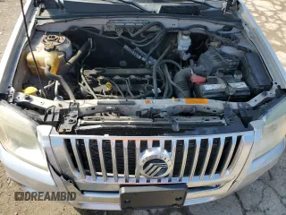 2009 Mercury Mariner Premier z VIN 4M2CU87769KJ11358, wystawiony jako Copart lot #55577235 z przebiegiem 206 627 mil mil oraz Szkody całkowita. Historia ofert i sprzedaży dostępna na DreamBid. Obrazek 12.