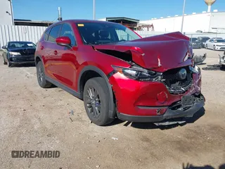 2020 Mazda CX-5 Touring with VIN JM3KFACM1L0756864, listed as a IAAI auction lot 41761131 with 16,646 mi miles and . Bid and sale history available at carsss.com. Image 1.