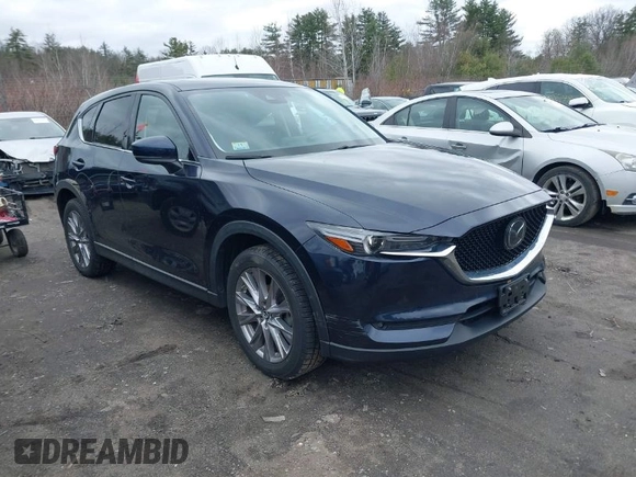 2020 Mazda CX-5 Grand Touring with VIN JM3KFBDM7L1723852, listed as a IAAI auction lot 41848152 with 85,099 mi miles. Bid and sale history available at carsss.com. Image 1.