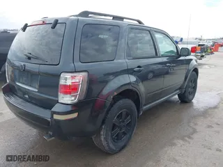 2010 Mercury Mariner with VIN 4M2CN8B77AKJ06310, listed as a IAAI auction lot 41650188 with 144,301 mi miles. Bid and sale history available at carsss.com. Image 4.