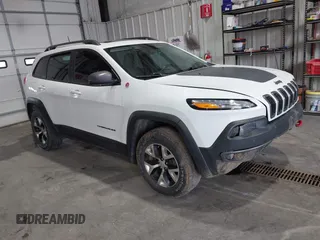 2017 Jeep Cherokee Trailhawk z VIN 1C4PJMBS5HW614956, wystawiony jako IAAI lot #42079991 z przebiegiem 143 378 mil mil oraz . Historia ofert i sprzedaży dostępna na DreamBid. Obrazek 1.