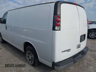 2014 Chevrolet Express Cargo Van with VIN 1GCSGAFX2E1121841, listed as a IAAI auction lot 42028712 with 164,768 mi miles. Bid and sale history available at carsss.com. Image 3.