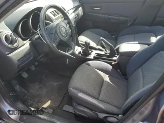 2004 Mazda 3 i with VIN JM1BK12F941210607, listed as a Copart auction lot 49387525 with 97,506 mi miles and Salvage Title. Bid and sale history available at DreamBid. Image 7.